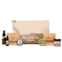 Acrely Farms gift set featuring a beige canvas zip pouch, and all of Acrely Farms mini products