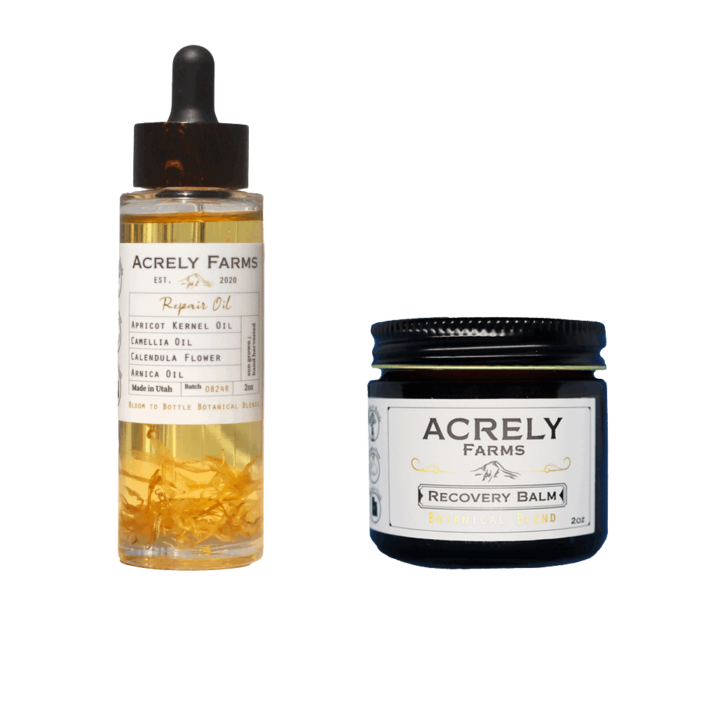 Two Acrely Farms products on a plain white background: a clear dropper bottle of Repair Oil with a black cap and a black jar of Recovery Balm with a white label.