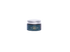 A small jar of CBD Cooling Balm with a dark teal label and a silver metal lid, centered on a solid white background.