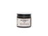 A small amber glass jar of Acrely Farms Recovery Balm with a black lid and a cream-colored label, set against a plain white background.