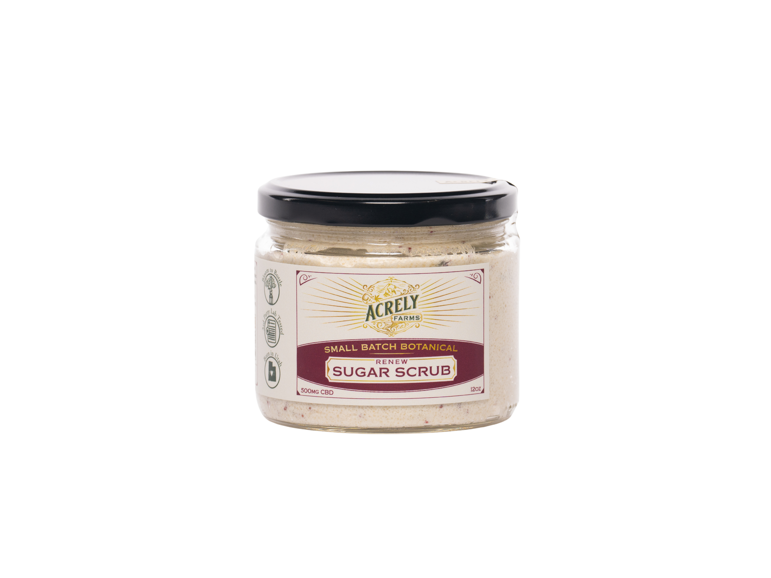A jar of Acrely Farms Small Batch Sugar Scrub, featuring a beige scrub inside a clear glass jar with a black lid and a cream-colored label.