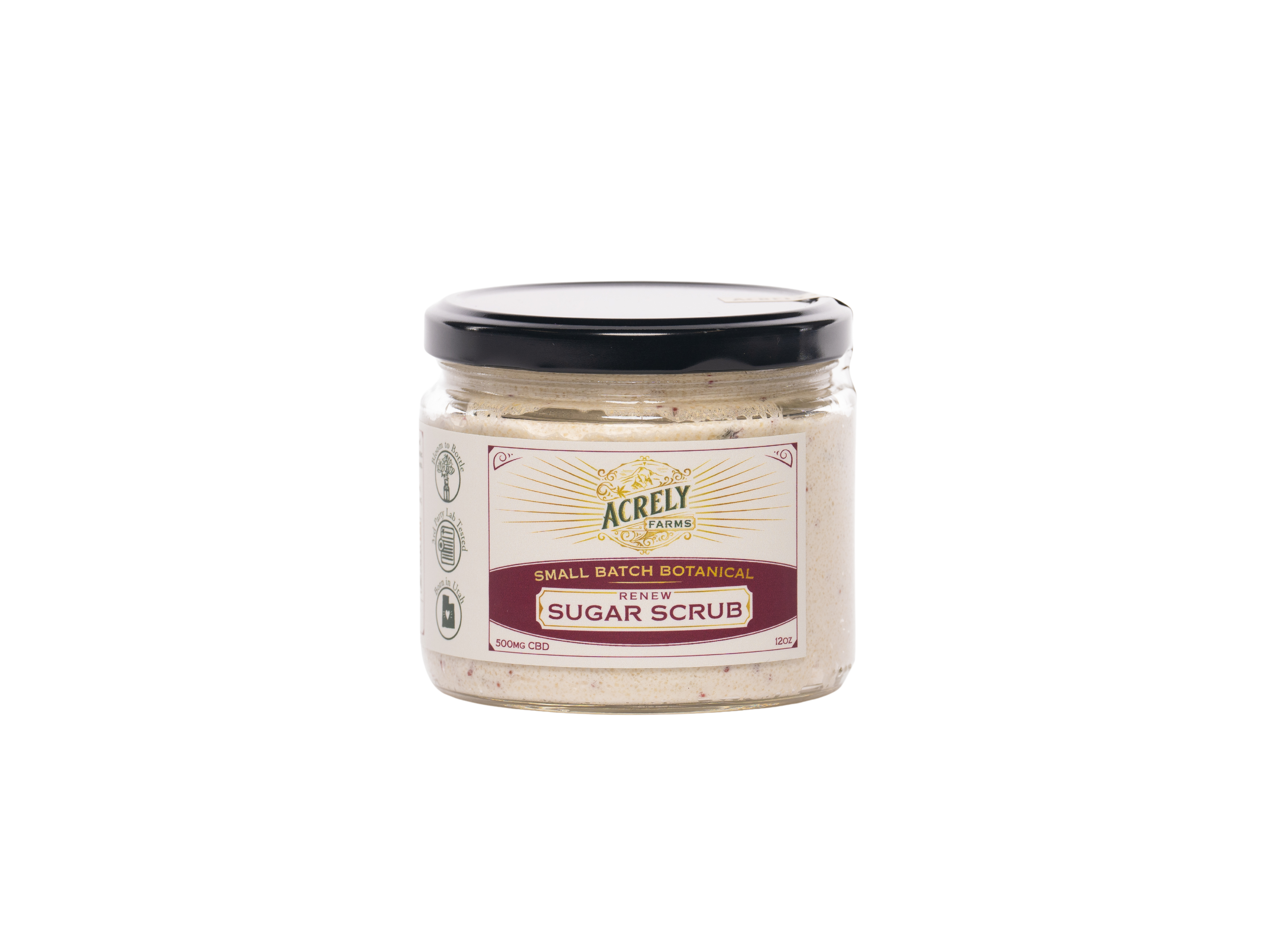 A jar of Acrely Farms Small Batch Sugar Scrub, featuring a beige scrub inside a clear glass jar with a black lid and a cream-colored label.