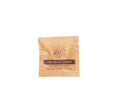A single packet of Acrely Farms CBD Relax Gummy, featuring a light tan and white patterned wrapper with a dark brown label, isolated on a white background.