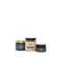 Three jars of Acxióy hair products arranged together on a plain white background, including a dark green jar with a gold lid, a clear jar filled with beige strands, and a dark green jar with a black lid.